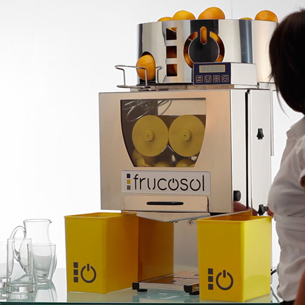 Frucosol F-50AC Automatic Juicer In-Use