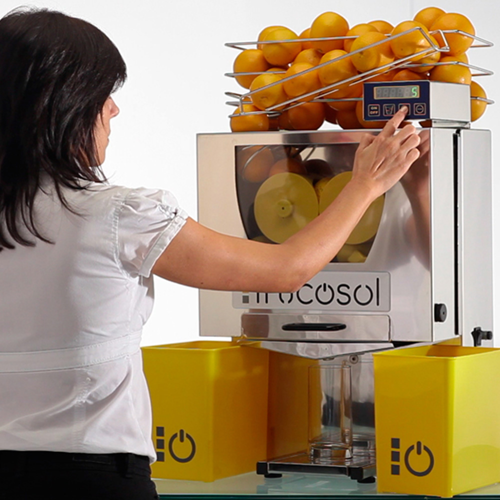 Frucosol F-50C Automatic Juicerr-in-use